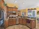 Well-equipped kitchen with stainless steel appliances, granite countertops, and ample cabinet space at 1830 E Fuchsia St, Pahrump, NV 89048