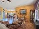 Comfortable living room with stylish furnishings and a view into the dining area at 1830 E Fuchsia St, Pahrump, NV 89048