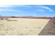 An expansive lot with ample space, ideal for building or recreation, enclosed by a secure fence at 1830 E Fuchsia St, Pahrump, NV 89048