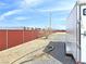 A trailer parked along the fence line of a property, offering storage or mobile space at 1830 E Fuchsia St, Pahrump, NV 89048