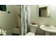 Functional bathroom with a shower-tub combination, pedestal sink, and standard fixtures at 1908 Hassett Ave, Las Vegas, NV 89104