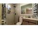 Updated bathroom features modern tile and fixtures, providing a luxurious and stylish space at 1908 Hassett Ave, Las Vegas, NV 89104