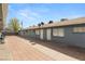Exterior of units with a brick walkway leading to each unit at 2424 Statz St, North Las Vegas, NV 89030