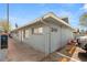 Exterior view of a multi-Gathering unit showing parking in front of each unit at 2424 Statz St, North Las Vegas, NV 89030