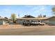 Street view of a multi-Gathering building with reserved parking spaces at 2424 Statz St, North Las Vegas, NV 89030