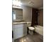 A bright full bathroom is equipped with a vanity and granite counter alongside a tub and shower combo at 2451 N Rainbow Blvd # 1156, Las Vegas, NV 89108
