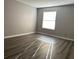 Comfortable bedroom featuring hardwood floors and a window at 2451 N Rainbow Blvd # 1156, Las Vegas, NV 89108