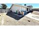 Exterior showing gravel yard and partial view of an attached garage on a sunny day at 2508 Alfa Cir, Las Vegas, NV 89142