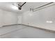 A functional two-car garage with an automatic door providing secure parking and storage options at 2621 Adelante Ave # 104, Las Vegas, NV 89106