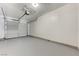 A spacious two-car garage with an automatic door offering lots of room for vehicles and storage at 2621 Adelante Ave # 104, Las Vegas, NV 89106