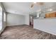 Bright and open living room with wood flooring, neutral tones, and lots of natural light at 2621 Adelante Ave # 104, Las Vegas, NV 89106