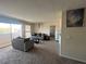 Comfortable living room with a nice view from the condo's balcony at 2845 Loveland Dr # 3616, Las Vegas, NV 89109
