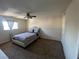 Main bedroom features neutral walls, carpet flooring, ceiling fan and large window at 2845 Loveland Dr # 3616, Las Vegas, NV 89109