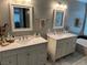 Spacious bathroom with double vanity sinks, quartz countertops and modern fixtures at 3316 Cutty Sark St, Las Vegas, NV 89117