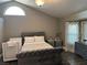 Cozy bedroom with luxury bed, window and natural lighting at 3316 Cutty Sark St, Las Vegas, NV 89117