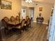 Elegant dining room featuring a wooden table with seating for eight and decorative chandelier at 3316 Cutty Sark St, Las Vegas, NV 89117