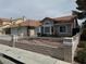 Inviting single story home with attached three-car garage, tile roof, and manicured desert landscaping at 3316 Cutty Sark St, Las Vegas, NV 89117