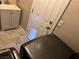 Functional laundry area, with a front-loading washer and dryer with laundry sink, cabinet, and door at 3316 Cutty Sark St, Las Vegas, NV 89117