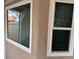 Exterior view showcasing newly installed white-framed windows, enhancing natural light and curb appeal at 3316 Cutty Sark St, Las Vegas, NV 89117