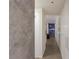 Hallway with built-in storage, leading to a living area with city views, offering a seamless transition at 3722 Las Vegas Blvd # 2904, Las Vegas, NV 89158