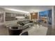 Modern living area featuring sleek kitchen and a stunning Las Vegas Strip view at 3722 Las Vegas Blvd # 2904, Las Vegas, NV 89158