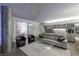 Open living space with a modern kitchen, comfortable seating, and access to a bedroom, designed for relaxation at 3722 Las Vegas Blvd # 2904, Las Vegas, NV 89158
