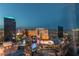 This is a spectacular and panoramic view of the lights of Las Vegas at dusk from a high vantage point at 3722 Las Vegas Blvd # 2904, Las Vegas, NV 89158