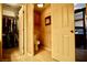A view of the bathroom with a toilet, cabinet, and part of the bedroom and walk in closet at 3916 Broad Meadow Ct, Las Vegas, NV 89129