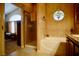 This is a bathtub shower with decorative tile and a stained glass window for character at 3916 Broad Meadow Ct, Las Vegas, NV 89129