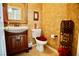 Cozy half-bathroom with vanity and toilet at 3916 Broad Meadow Ct, Las Vegas, NV 89129