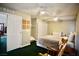 Large bedroom with ceiling fan, storage, and bed, and attached sitting area at 3916 Broad Meadow Ct, Las Vegas, NV 89129