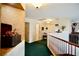 Open hallway leading to bedrooms and living area upstairs and wood railing at 3916 Broad Meadow Ct, Las Vegas, NV 89129