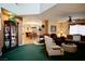 Cozy living room features ceiling fan, fireplace, and opens to dining room at 3916 Broad Meadow Ct, Las Vegas, NV 89129