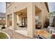 Covered patio with ceiling fan, supports, and outdoor seating is perfect for relaxing and entertaining guests at 3916 Broad Meadow Ct, Las Vegas, NV 89129