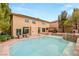 Stunning pool and spa with spacious patio, ideal for outdoor entertaining in a private backyard setting at 4195 Balmoral Castle Ct, Las Vegas, NV 89141