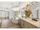 Spacious bathroom with dual vanities, a soaking tub, and a separate shower at 4195 Balmoral Castle Ct, Las Vegas, NV 89141