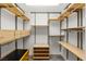 Well-organized walk-in closet with custom shelving and storage solutions at 4195 Balmoral Castle Ct, Las Vegas, NV 89141