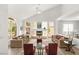 Bright living room with high ceilings, a modern fireplace, and stylish furnishings at 4195 Balmoral Castle Ct, Las Vegas, NV 89141