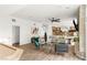 Open-concept living space with modern design, wet bar, and bright, airy atmosphere at 4195 Balmoral Castle Ct, Las Vegas, NV 89141