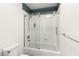 Contemporary bathroom features a clear glass shower door and tile accent creating a clean and modern design at 4195 Balmoral Castle Ct, Las Vegas, NV 89141