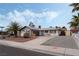Attractive single-story home featuring a two-car garage and a low-maintenance desert yard at 420 Altamira Rd, Las Vegas, NV 89145