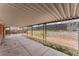 A covered patio that opens up to the backyard at 420 Altamira Rd, Las Vegas, NV 89145