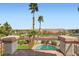 Scenic view from balcony overlooking the pool and green neighborhood at 442 Beardsley Cir, Henderson, NV 89052