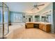 Large bathroom with tiled floors, double vanity, soaking tub, and lots of natural light at 442 Beardsley Cir, Henderson, NV 89052