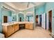 Bathroom featuring a double vanity, tiled floors, and access to closet at 442 Beardsley Cir, Henderson, NV 89052