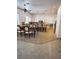 Spacious kitchen with modern appliances, a large island, and an adjacent dining area at 442 Beardsley Cir, Henderson, NV 89052