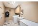 Functional laundry room featuring a washer, dryer, sink, and storage cabinets at 442 Beardsley Cir, Henderson, NV 89052
