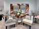 Elegant living room featuring decorative wall art, cozy seating, and contemporary accents at 5518 Stormy Night Ct, Las Vegas, NV 89120