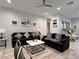 Comfortable living room features recessed lighting, modern decor and light wood-look flooring at 5518 Stormy Night Ct, Las Vegas, NV 89120