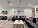 Open living room with modern decor, recessed lighting and light wood-look flooring at 5518 Stormy Night Ct, Las Vegas, NV 89120